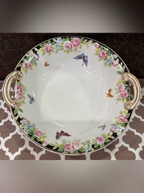 Nippon Hand-painted bowl featuring a floral motif & butterflies with gold trim